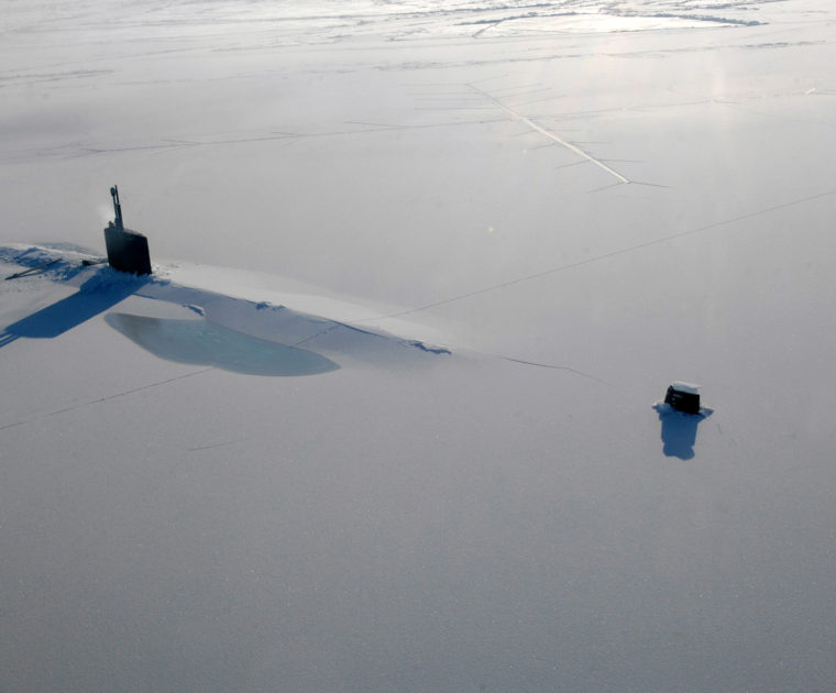 US Navy attack submarine USS Annapolis rests in the Arctic Ocean after surfacing through three feet of ice during Ice Exercise 2009 on 21 March 2009. Wikimedia