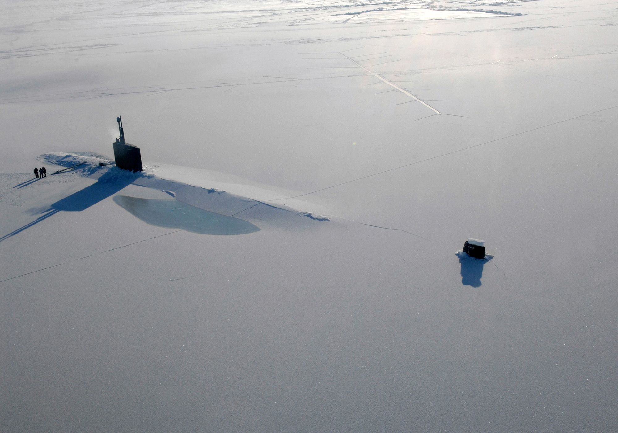 US Navy attack submarine USS Annapolis rests in the Arctic Ocean after surfacing through three feet of ice during Ice Exercise 2009 on 21 March 2009. Wikimedia