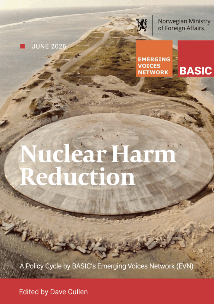 Cover of a publication, entitled 'Nuclear Harm Reduction'. The logos of the Norwegian Ministry of Foreign Affairs, the Emerging Voices Network and BASIC are featured at the top of the page. The cover image is of a huge weathered concrete dome structure, with people standing on it. The people appear very small from this distance. The dome is surrounded by concrete detritus and disturbed ground. It is positioned on the edge of a small island, which stretches away from the viewer, looking less disturbed further away. The line of a reef is visible in the ocean beyond.