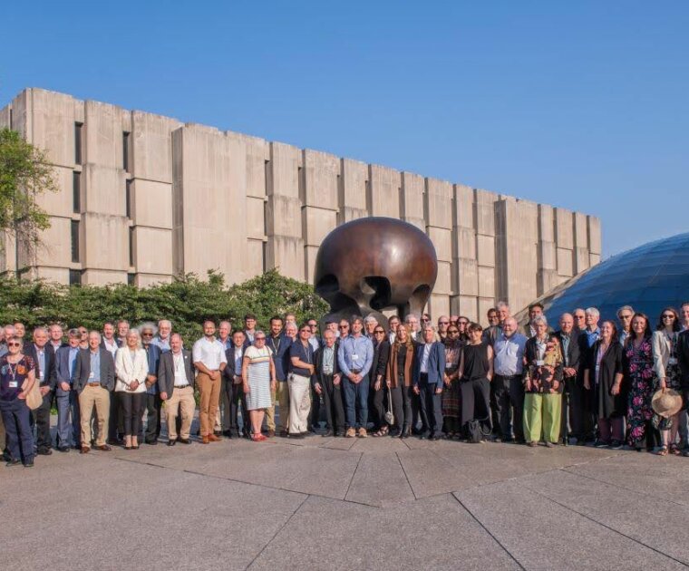 Delegates at the conference alongside a Henry Moore “Nuclear Energy” sculpture in Chicago