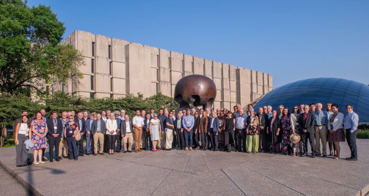 Delegates at the conference alongside a Henry Moore “Nuclear Energy” sculpture in Chicago