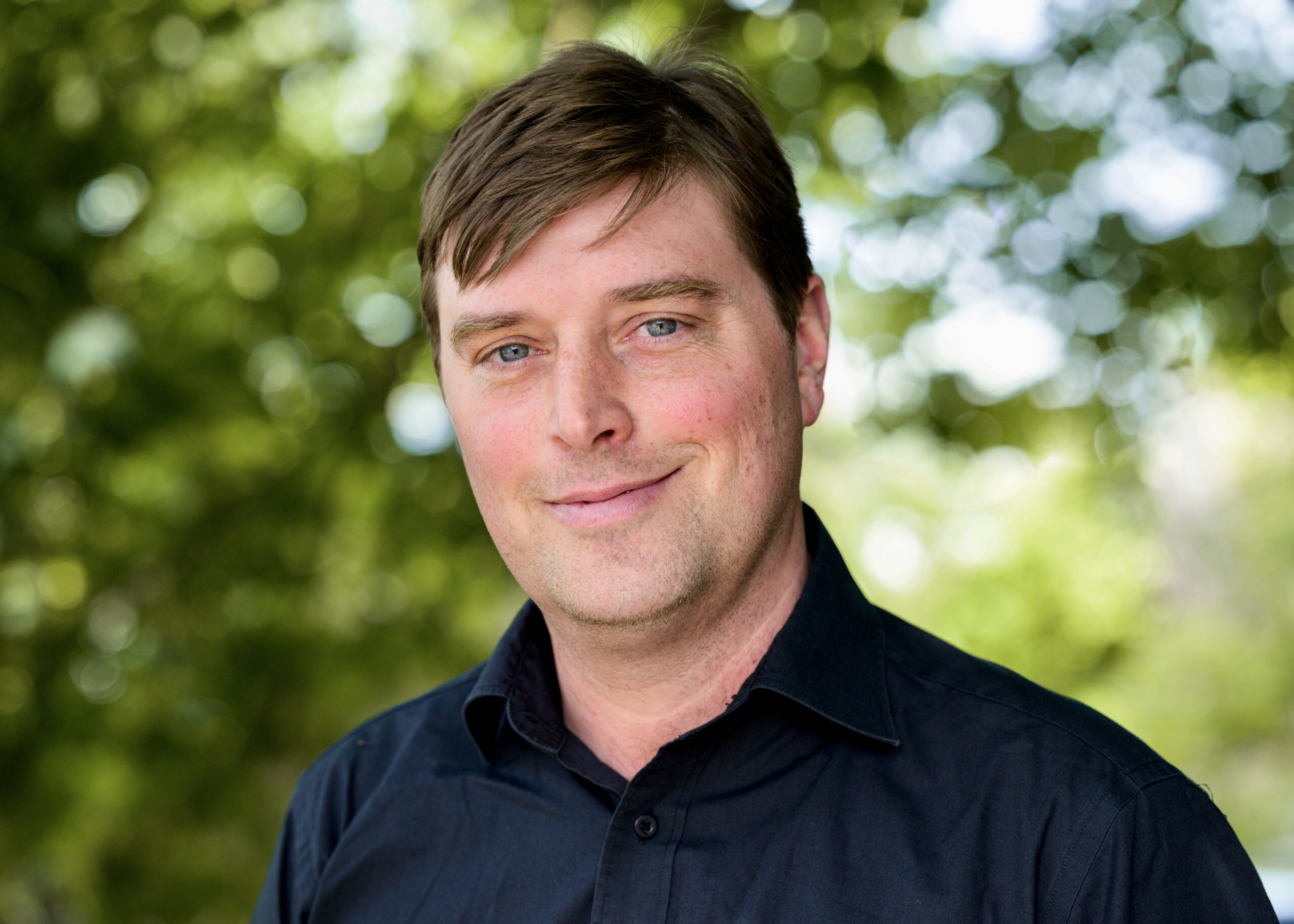 Dave Headshot colour 1 scaled