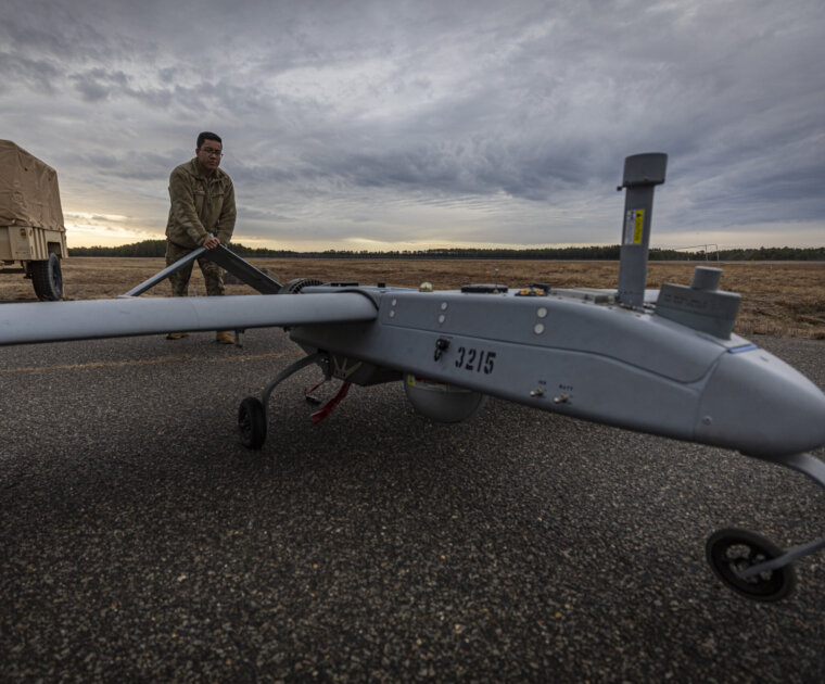 U.S. Army Pfc. Antonio Arriola, a Soldier with the New Jersey National Guard’s Det. 1, D Co., 104th Brigade Engineer Battalion “Skydevils” pushes an RQ-7B Shadow unmanned arial system on Joint Base McGuire-Dix-Lakehurst, N.J., Feb. 10, 2020. U.S. Air National Guard photo by Master Sgt. Matt Hecht
