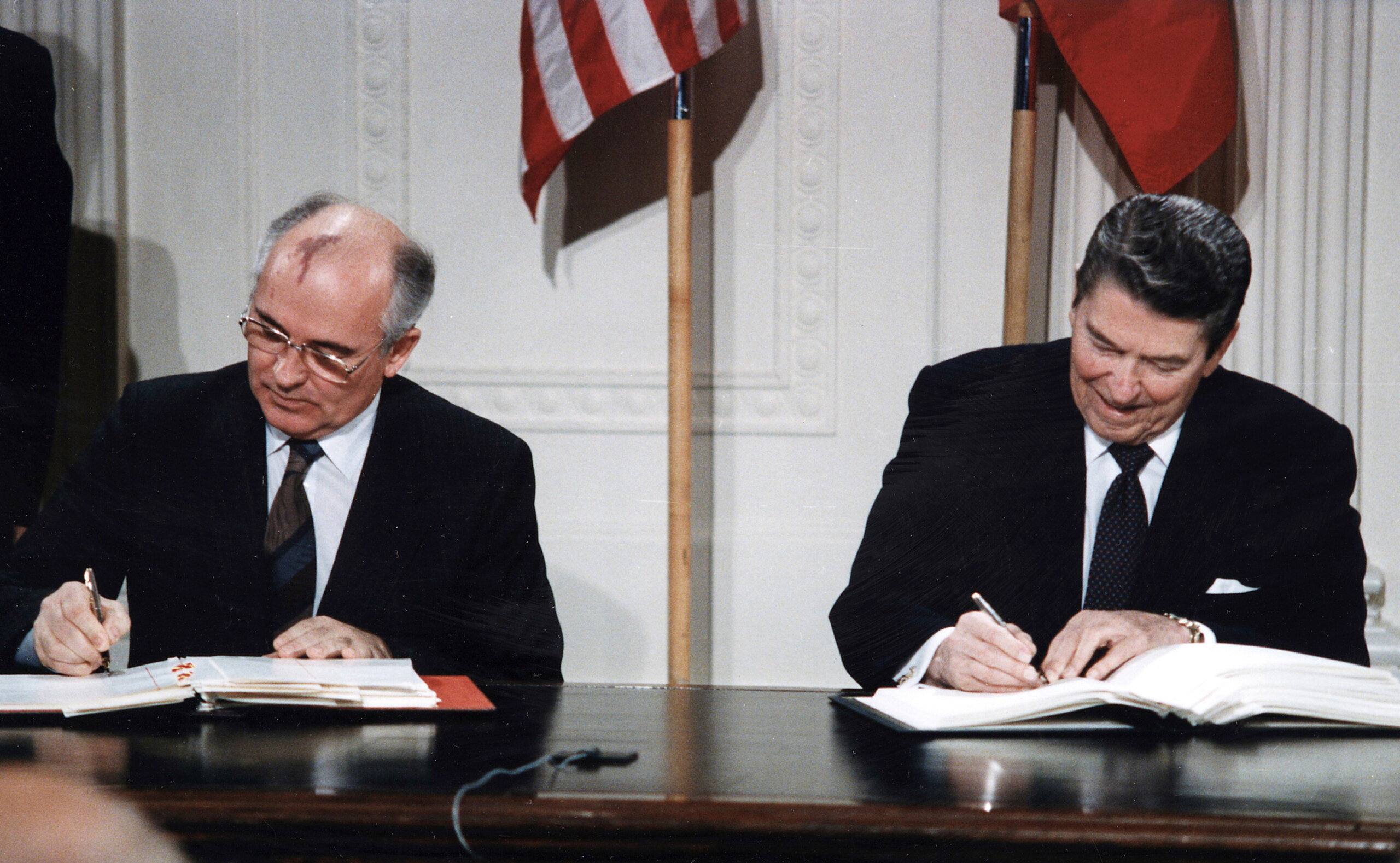 Reagan and Gorbachev signing scaled